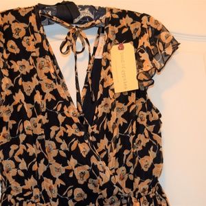 Light weight flowing mid calf dress.